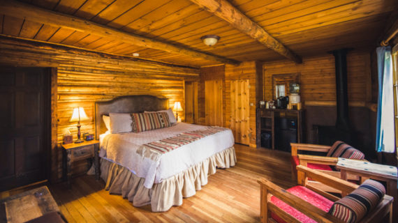 Basecamp C/D cabin master bedroom with a king size bed.