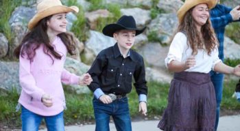 Children in cowboy hats