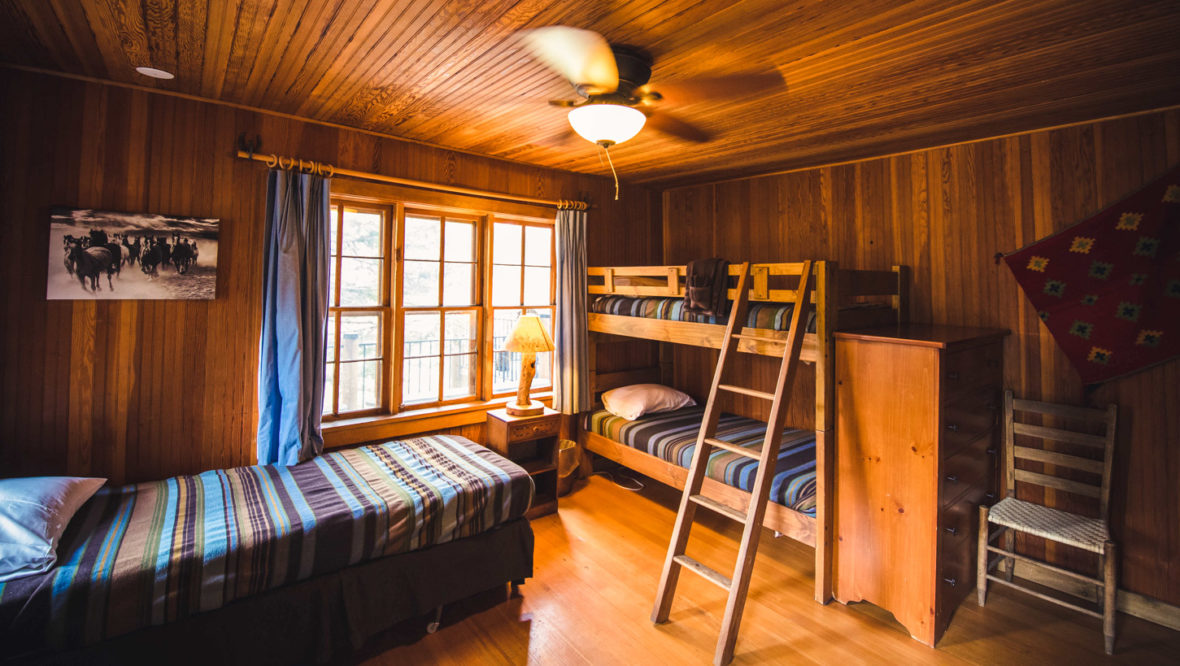 Ranch A/B cabin kid's bathroom with bunk beds.